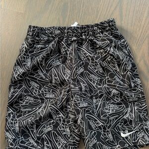 Nike Boys Black Swim Shorts with White Sneaker Outline Print
